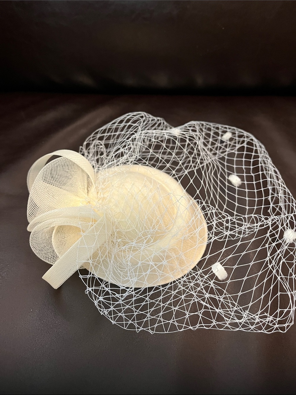 Elegant Cream Fascinator with Netting